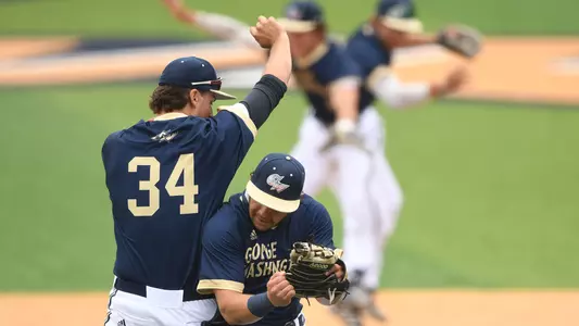 Derek Ripp and Steve Barmakian celebrate a victory