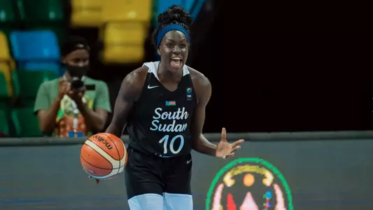 Nya Lok brings the ball up court for South Sudan.