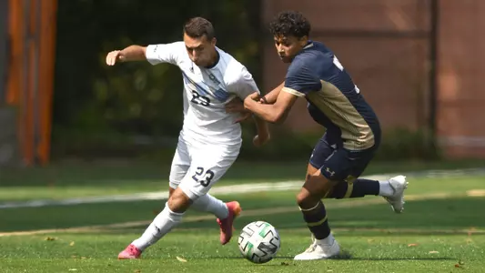 Matthew Brummet battles for the ball vs. Navy.