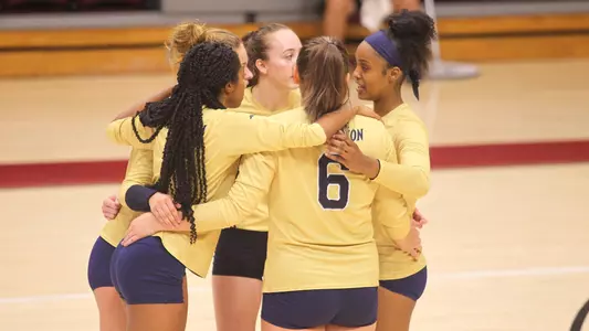 Volleyball huddles vs. TSU