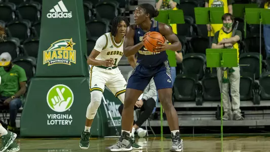 Mayowa Taiwo competes against George Mason