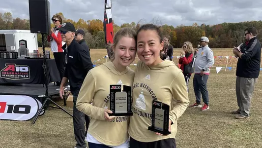 Sarah Mitchell and Yukino Parle are presented their All-Conference honors at the 2022 A-10 Championship
