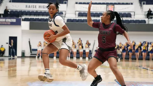 Nya Robertson works one-on-one against a UMES defender