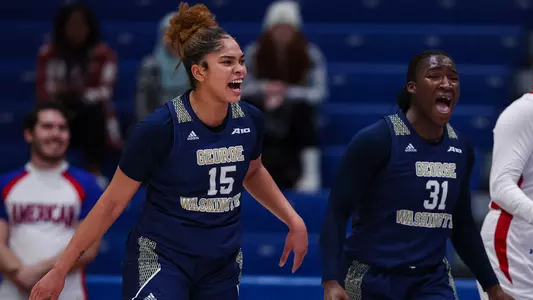 Taylor Webster and Mayowa Taiwo celebrate a game-winning bucket by Mia Lakstigala