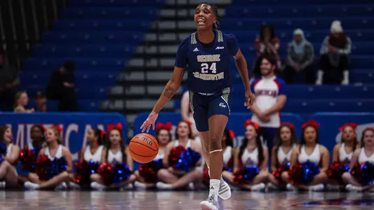 Asjah Inniss dribbles the ball up against American