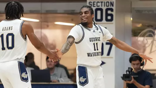 James Bishop celebrates with Brendan Adams