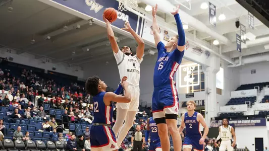 Ricky Lindo skies for a layup against American