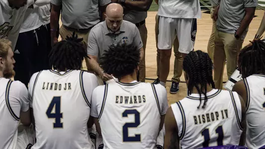 Chris Caputo diagrams a play during a timeout