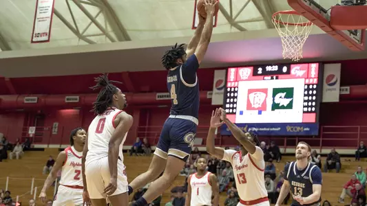 Ricky Lindo Jr. dunks the ball at Radford