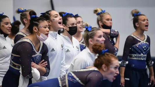 Gymnastics cheers on teammates at Lindsey Ferris