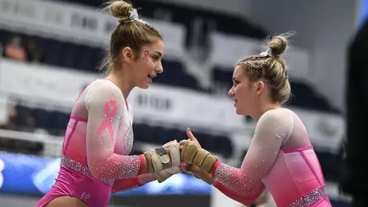 Marlee York and Kendall Whitman fist bump at Pink Meet
