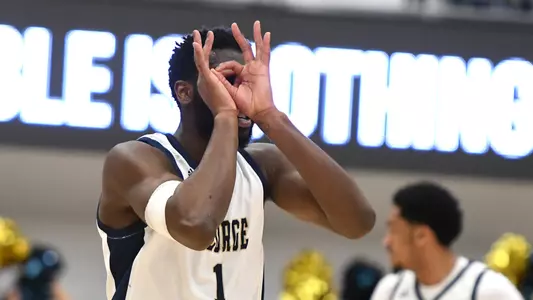 Joe Bamisile celebrates a 3-pointer vs. La Salle