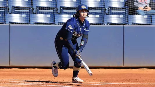Daniella Wilson watches a fly ball vs. Rider.