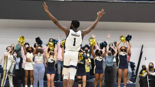 Joe Bamisile celebrates a 3-pointer vs. Duquesne.