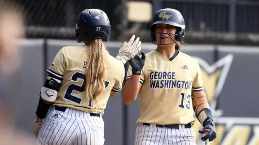 Sierra Lange high-fives Hannah Eslick vs. Georgetown.