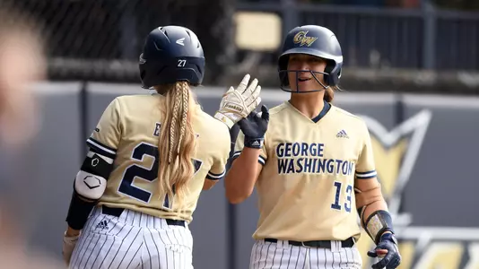 Sierra Lange high-fives Hannah Eslick vs. Georgetown.