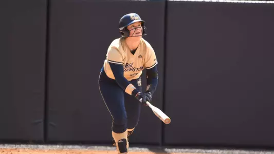 Alexa Williams watches a hit vs. Dayton.