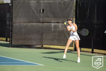Stella Wiesemann swings the racquet at the Atlantic 10 Championship