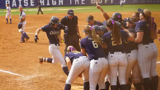 Alexa Williams celebrates after hitting a walk-off home run vs. Saint Louis.