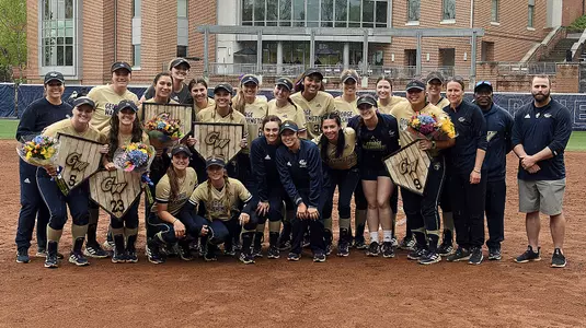 GW softball poses with its 2022 Senior Weekend honorees.