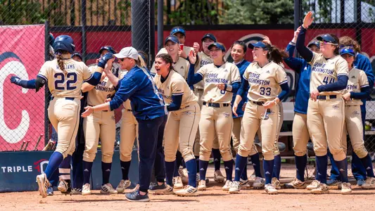 Alexa Williams is greeted after hitting a home run vs. Kansas.