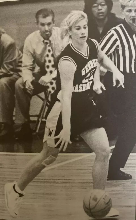 Cathy (Neville) Cranberg was a reliable contributor and two-time team captain during a tremendous run of success for GW women's basketball from 1991-1995.