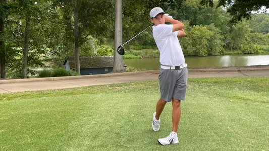 Jed Dy swings the golf club