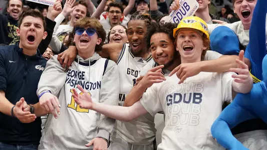 Brendan Adams and Maximus Edwards celebrate with George's Army