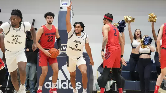 Ricky Lindo Jr. points to his teammate