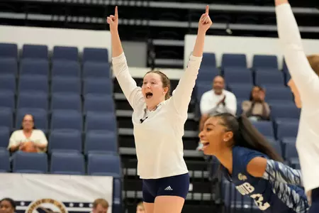 Maeve Loughran celebrates a point vs George Mason