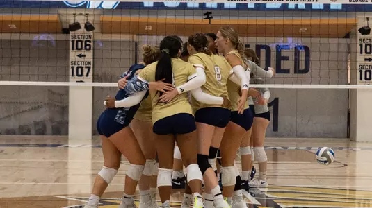 Volleyball Team Huddle vs. Georgetown