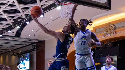 Maximus Edwards scores on a reverse layup vs. Delaware