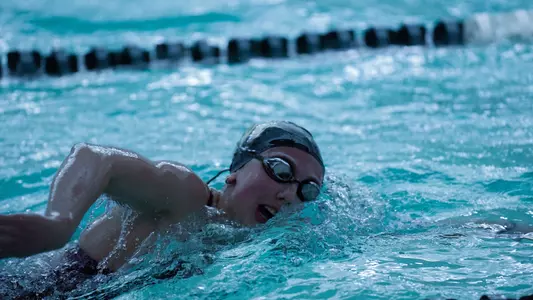 Ava Topolewski swimming at practice