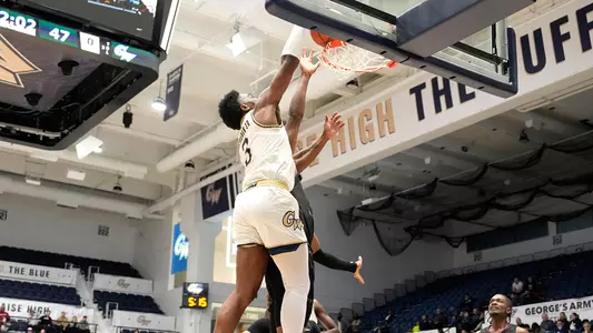 Darren Buchanan dunks over a Maryland Eastern Shore defender