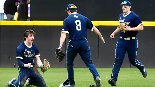 Sam Gates celebrates with his teammates following a diving catch against #11 East Carolina