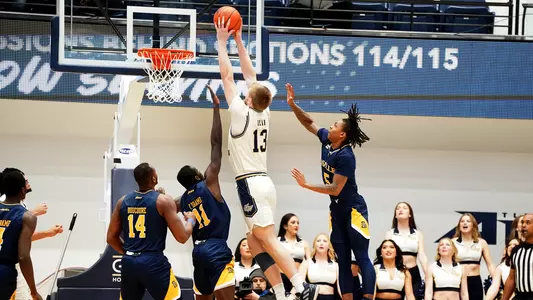 Hunter Dean skies for a slam dunk vs. La Salle