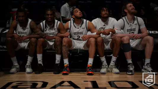 GW's starting lineup awaits their introduction at the A-10 Championship