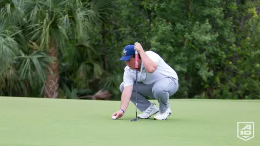 Manuel Barbachano lines up to putt at Atlantic 10 Championship