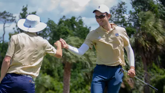 Jakub Hrinda celebrates on the green