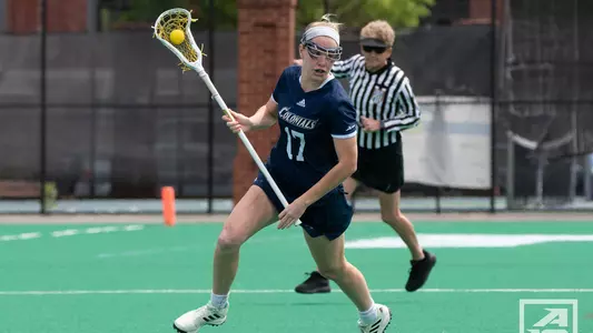 Kerry McKeever carries the ball vs Davidson in A-10 quarterfinal