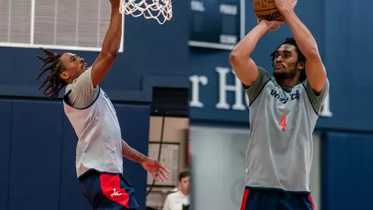 Brendan Adams and Ricky Lindo workout for the Wizards