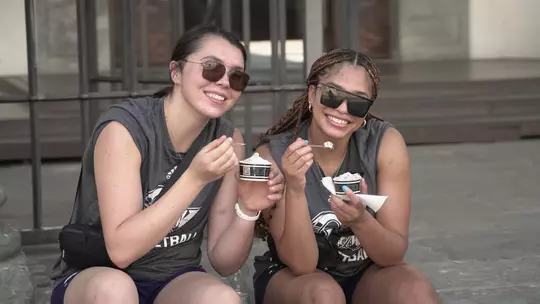 Maren Durant and Taylor Webster enjoy gelato in Italy
