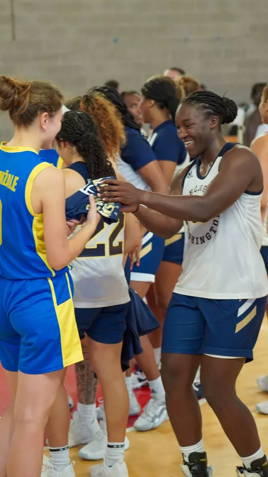 Mayowa Taiwo gives a gift to opposing team on Foreign Tour