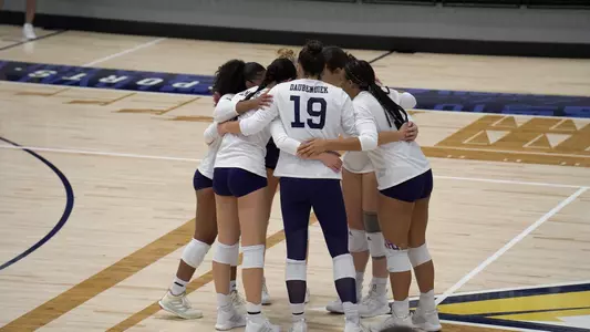 Volleyball huddles vs. North Alabam