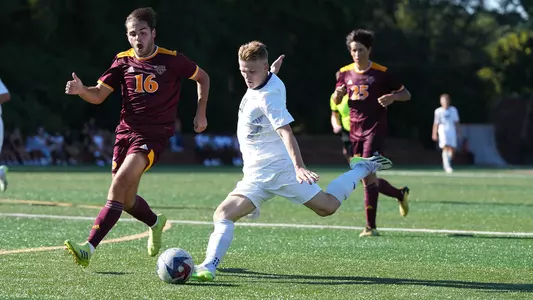 Louis Saville sends in a cross against Iona