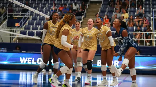 Volleyball celebrates at Howard