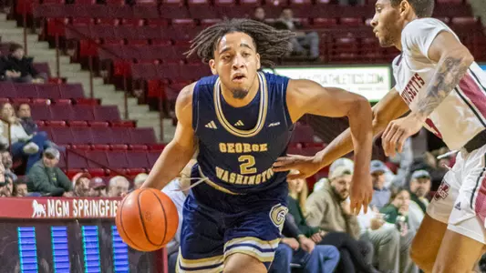 Maximus Edwards drives against UMass