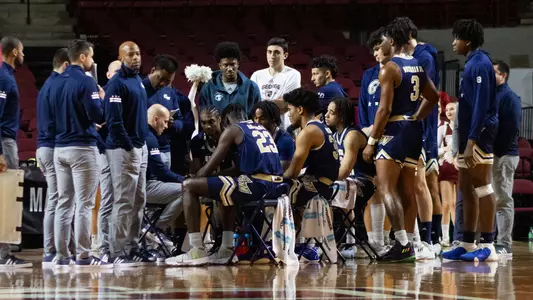 Men's Basketball during a timeout at Massachusetts