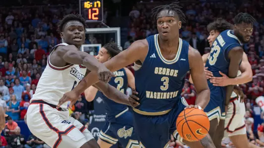 Darren Buchanan Jr. drives the lane against Dayton