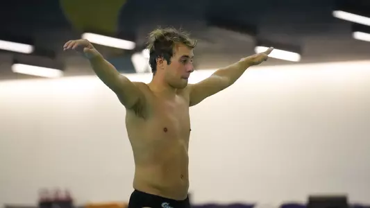 Holden Wheeler preparing to dive at the Smith Center